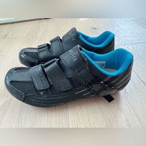 Shimano size 39 spin shoes with SPD clips on the bottom.